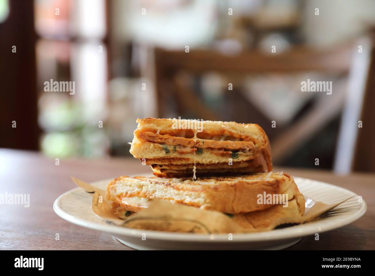 Panini with ham and sausage sandwich Stock Photo Alamy