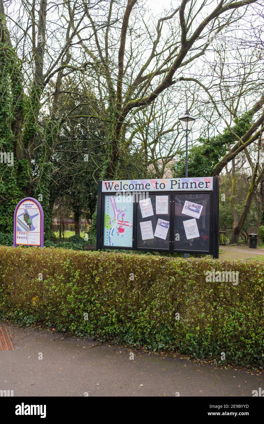 Pinner town community notice board at Bridge Street Gardens, a small