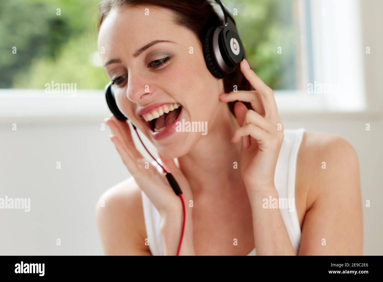 Fun girl listening to music Stock Photo