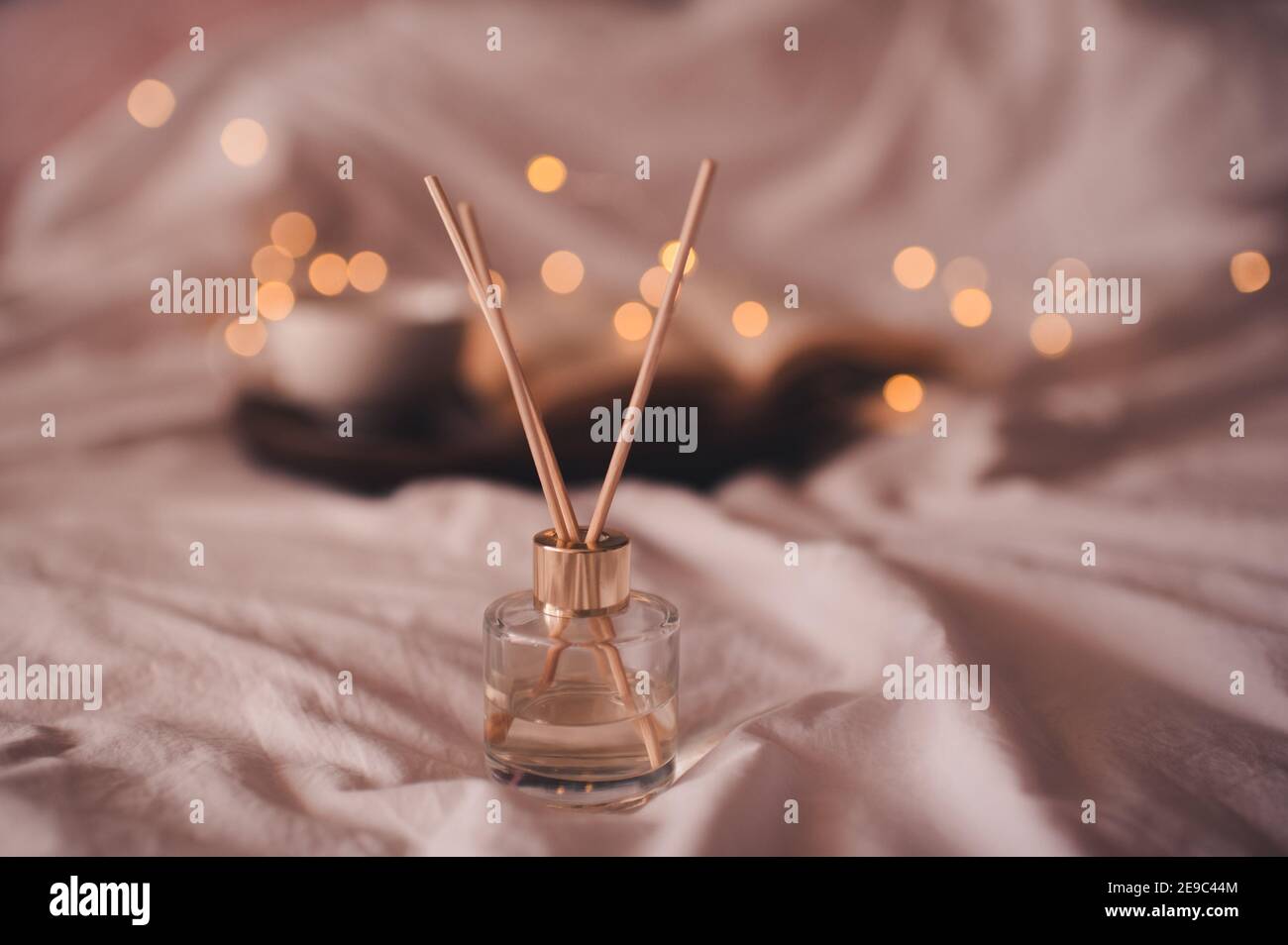 Close up of luxury perfume bottle with blurry bokeh light