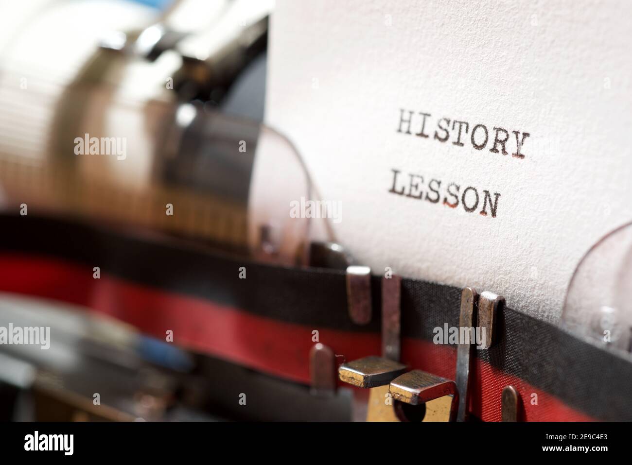 Lessons Learned Typewriter History lesson phrase written with a typewriter Stock Photo - Alamy
