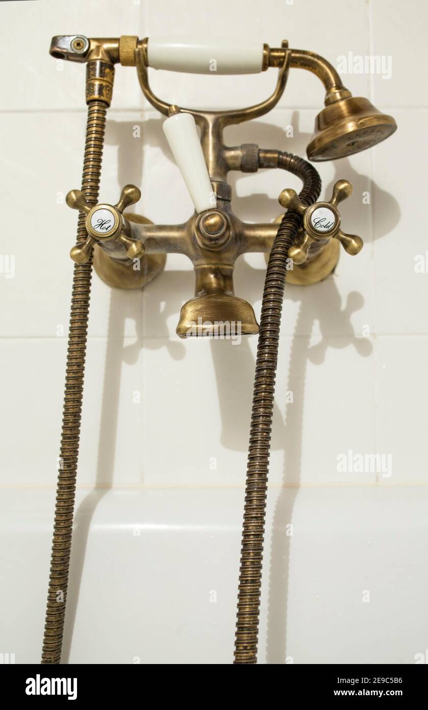 Antique Copper style bath tube faucet. Selective focus. Stock Photo