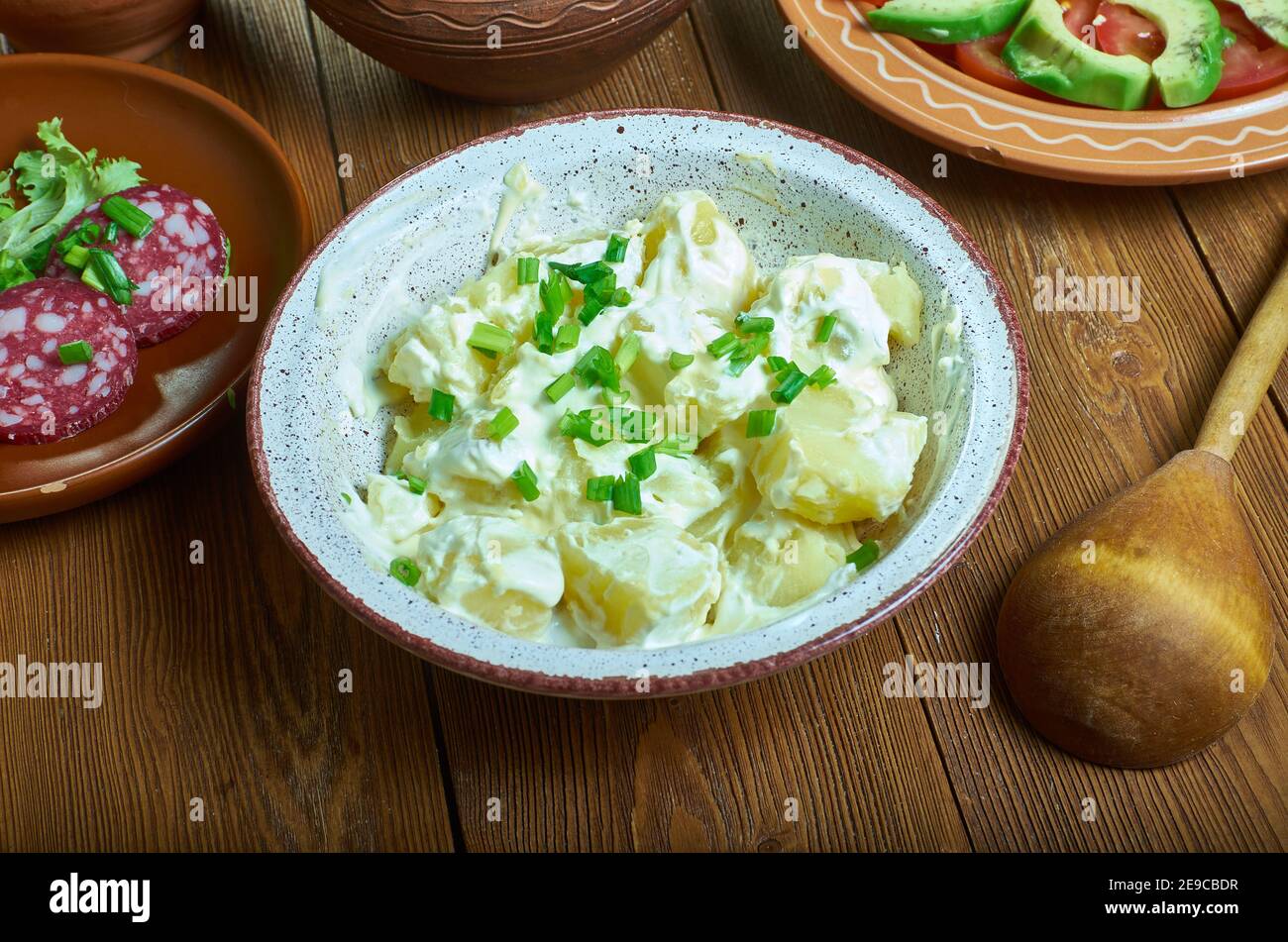 Irish Potato Salad, Cut and steam the potatoes until tender Stock Photo