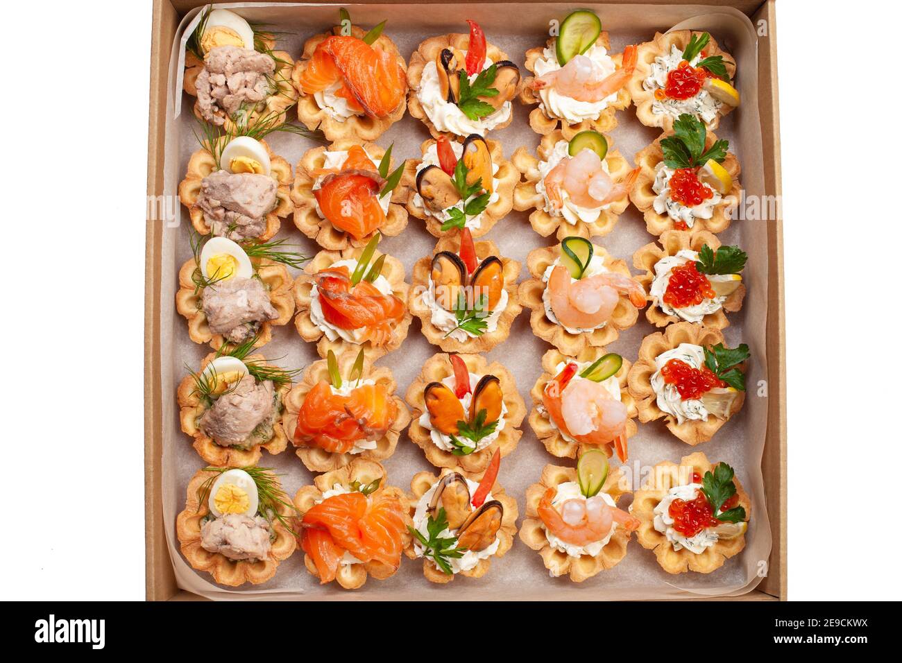 Boxing with food, cardboard box with snacks, home delivery. Catering. Gift  box for any holiday. Ready family dinner, party food Stock Photo - Alamy