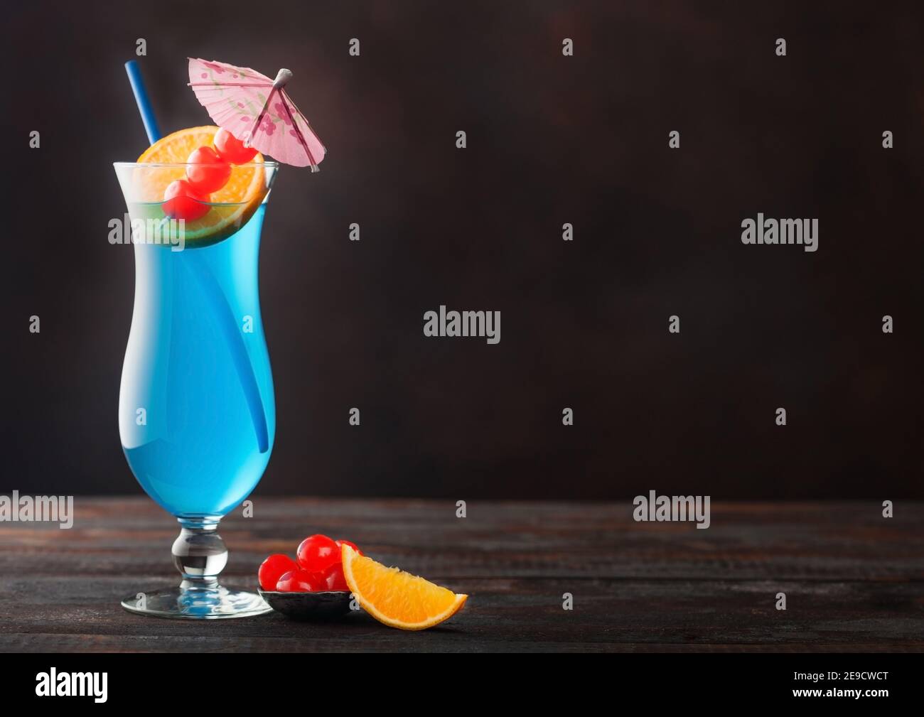Blue lagoon summer cocktail in classic glass with sweet cocktail ...