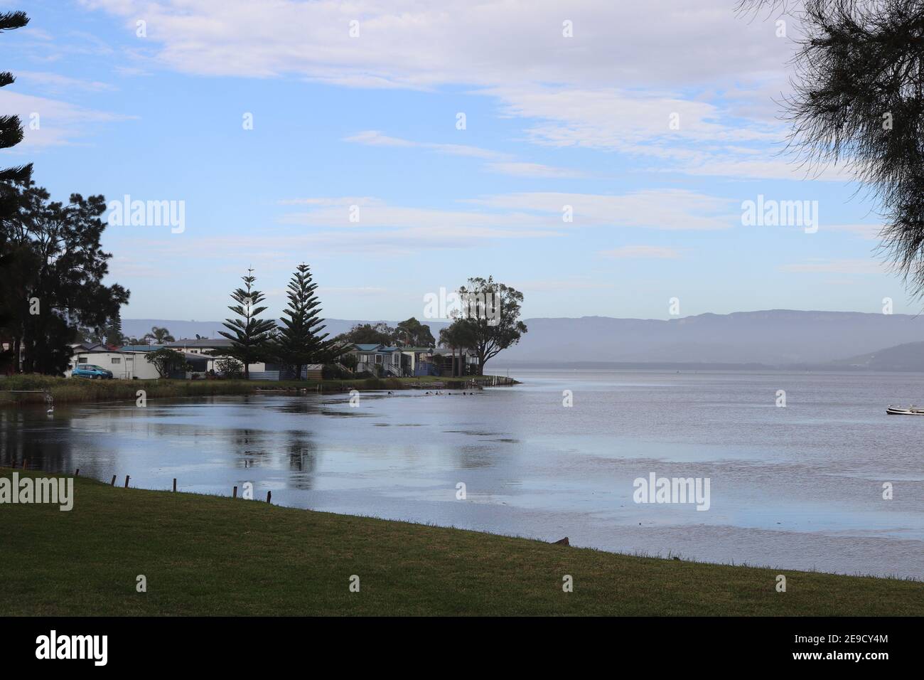 Beautiful view of Lake Illawarra with buildings background in Australia