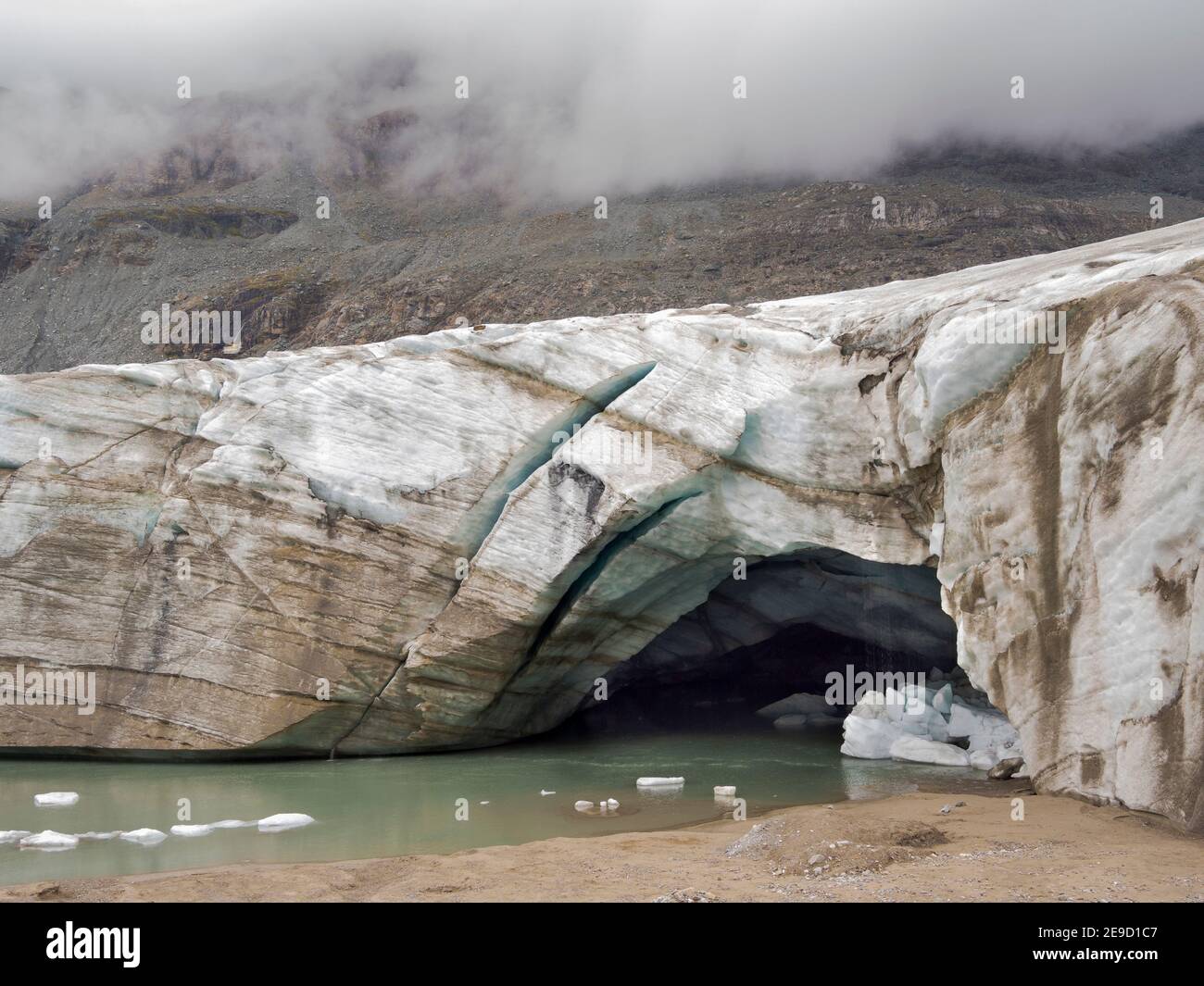 Glacier snout of glacier Pasterze at Mount Grossglockner, which is melting extremely fast due to global warming. Europe, Austria, Carinthia Stock Photo