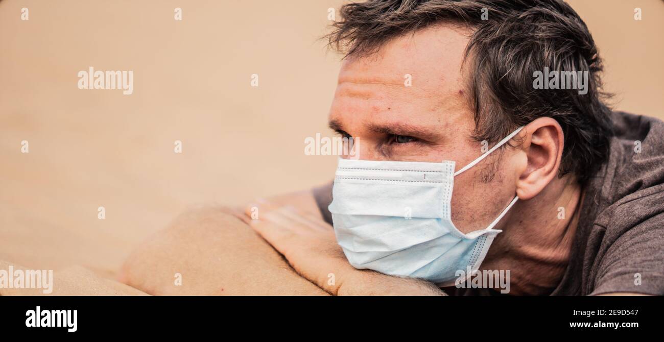 Stomish Mask BANNER Close-up side portrait man wear mask, face expression emotion ...