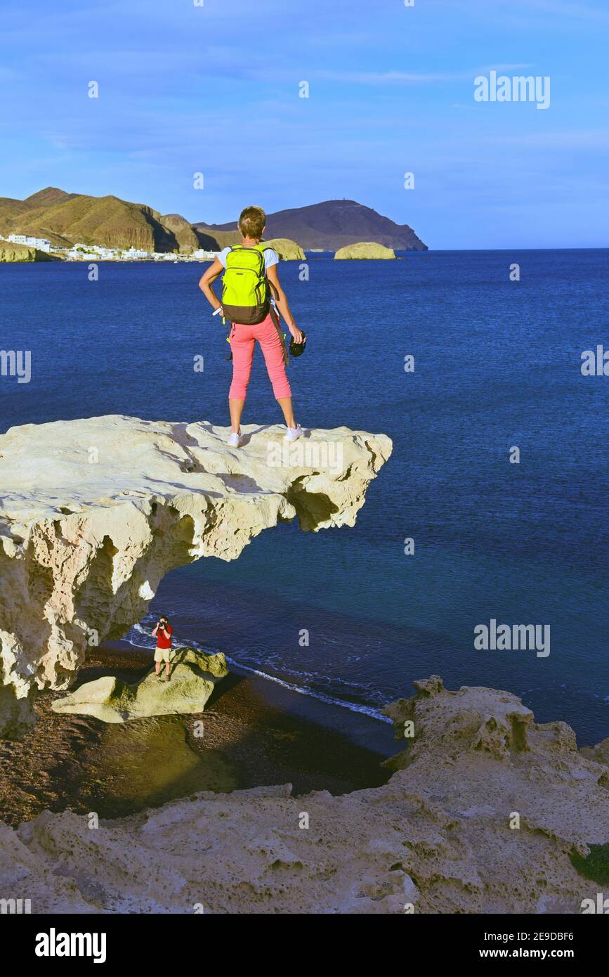 tourists on the beach of Arco, Spain, Andalusia, Parque Natural de Cabo de Gata-Nijar, Los Escullos Stock Photo