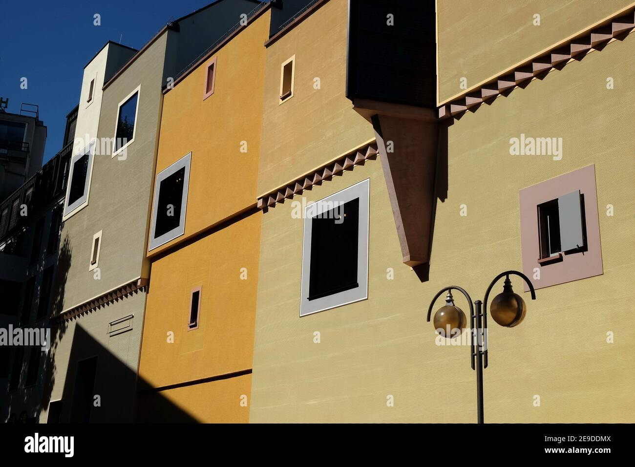 Modern residential houses under a clear blue sky background Stock Photo ...