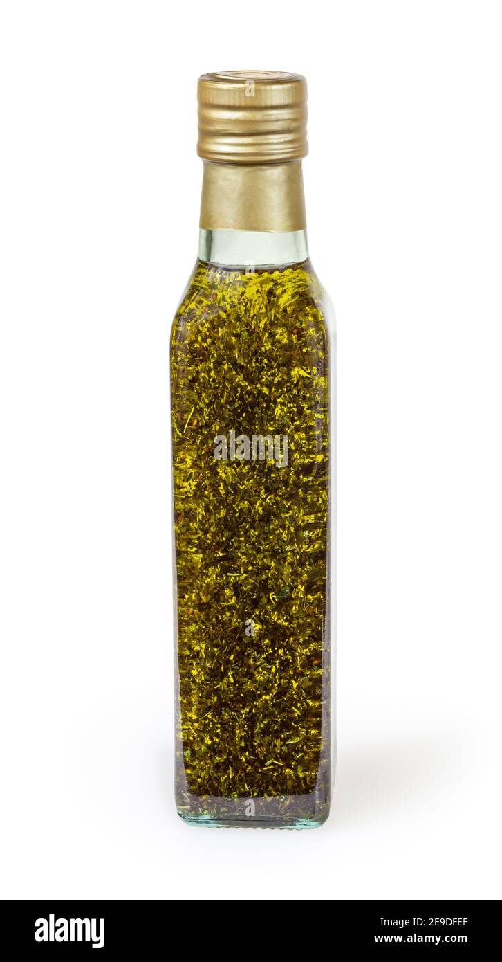Olive oil with basil in glass bottle isolated on white backgound with ...