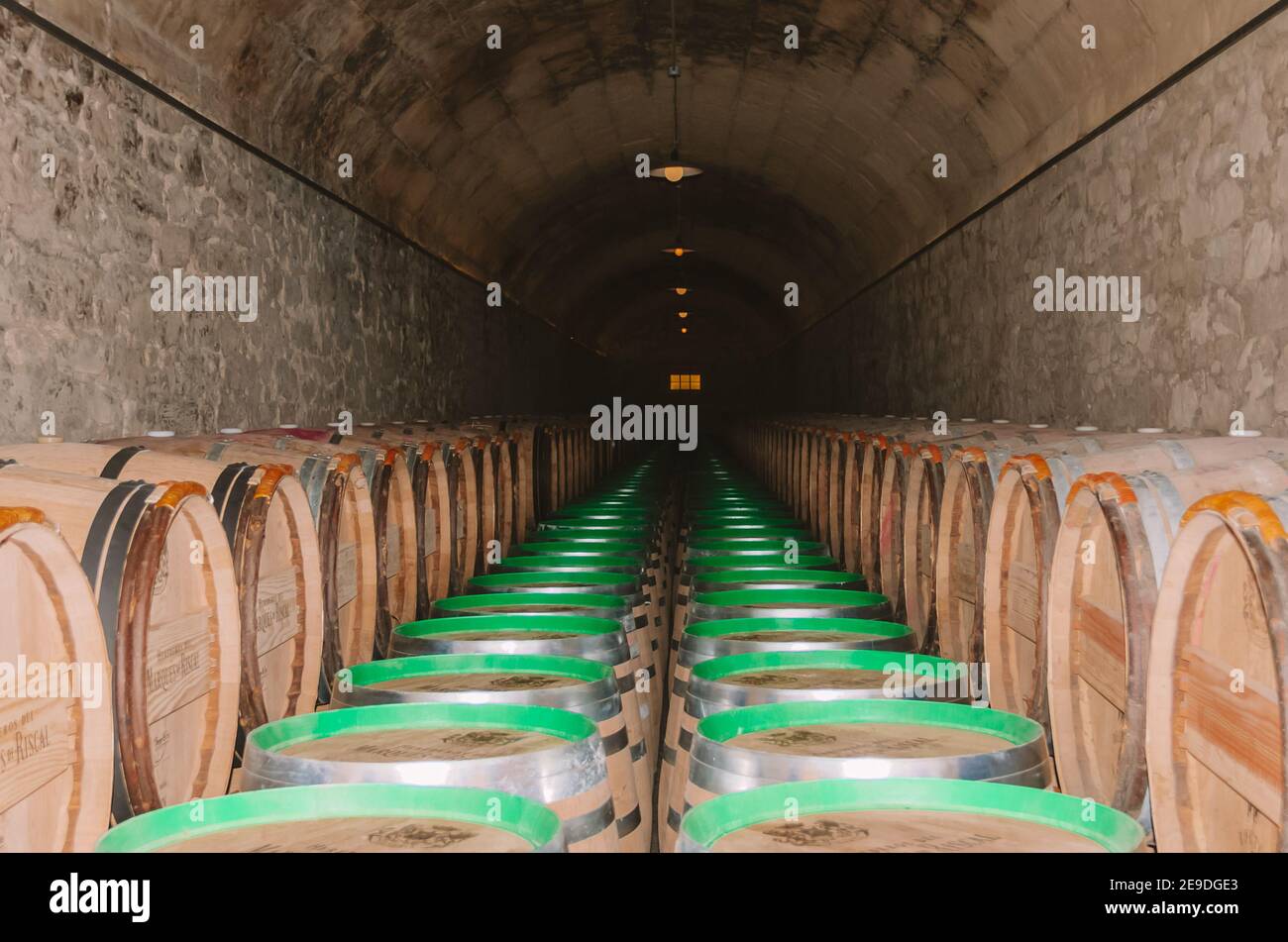 EL CIEGO, ÁLAVA, SPAIN - Jan 30, 2021: The picture shows some wine barrels lined up from the Marques de Riscal Winery Stock Photo