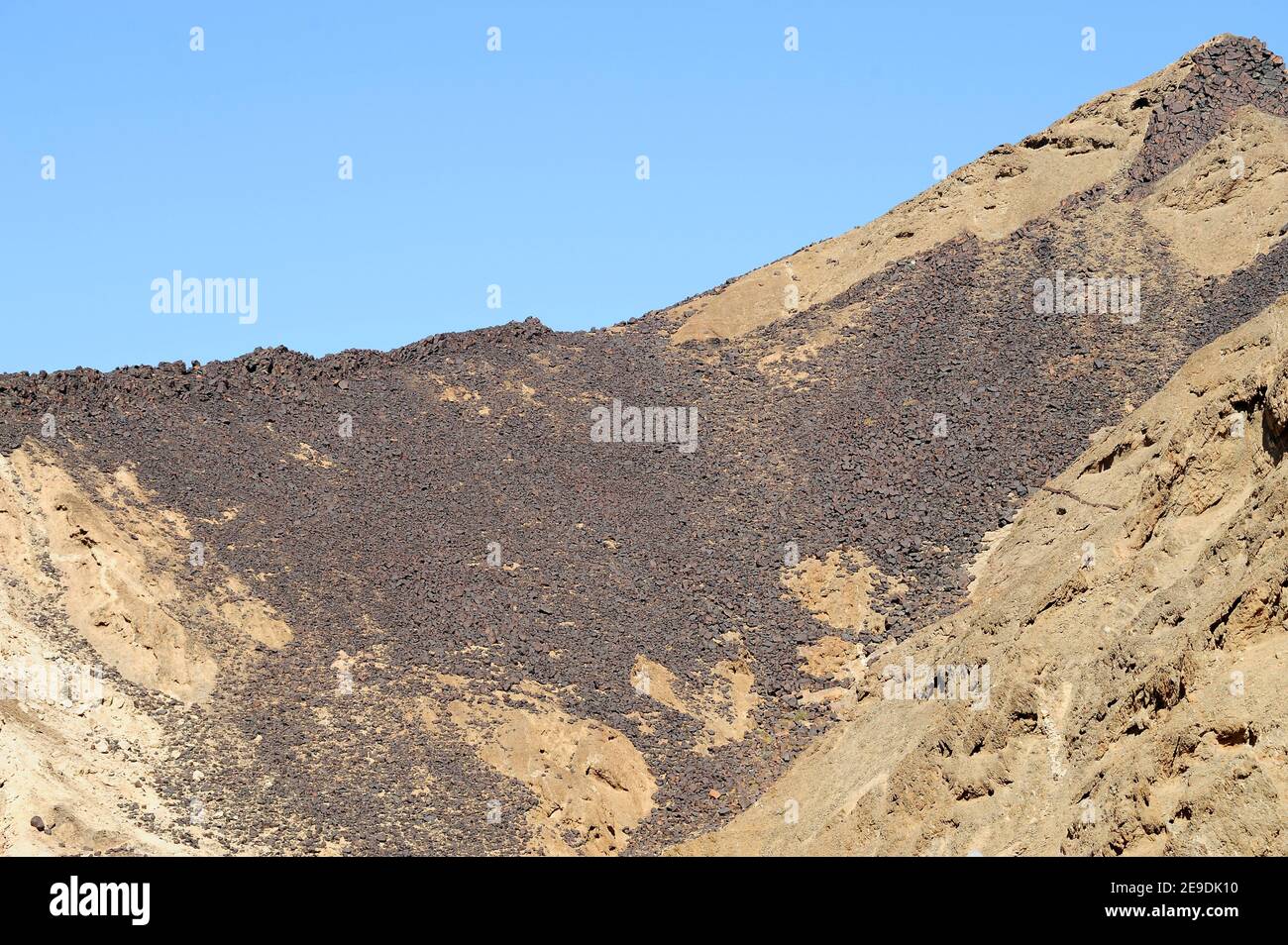 Diabase dike near Swakopmund, Namibia. Diabase, dolerite, ophite or microgabbro is a subvolcanic rock. Stock Photo