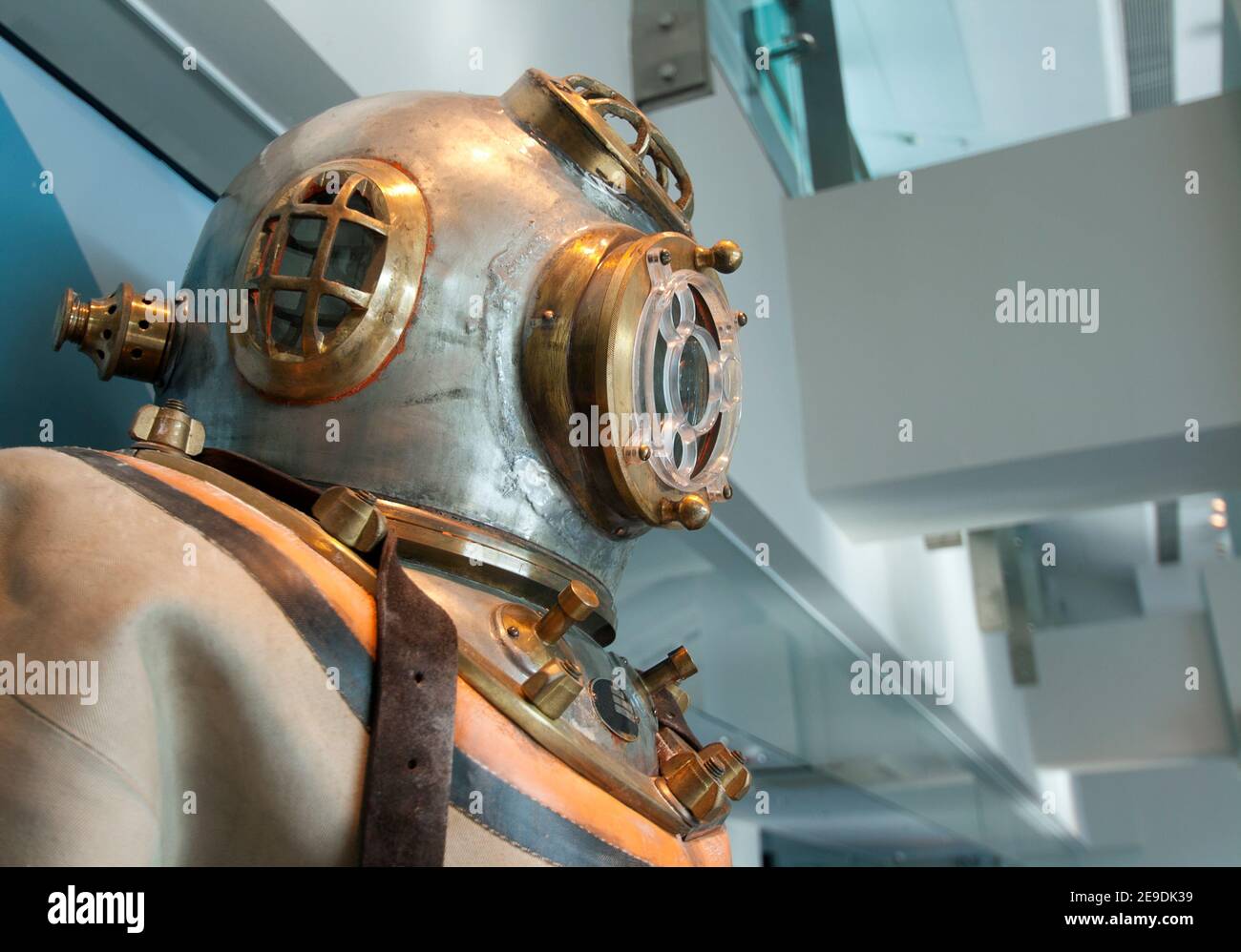 Retro diving suit with steel and copper dive helmet Stock Photo
