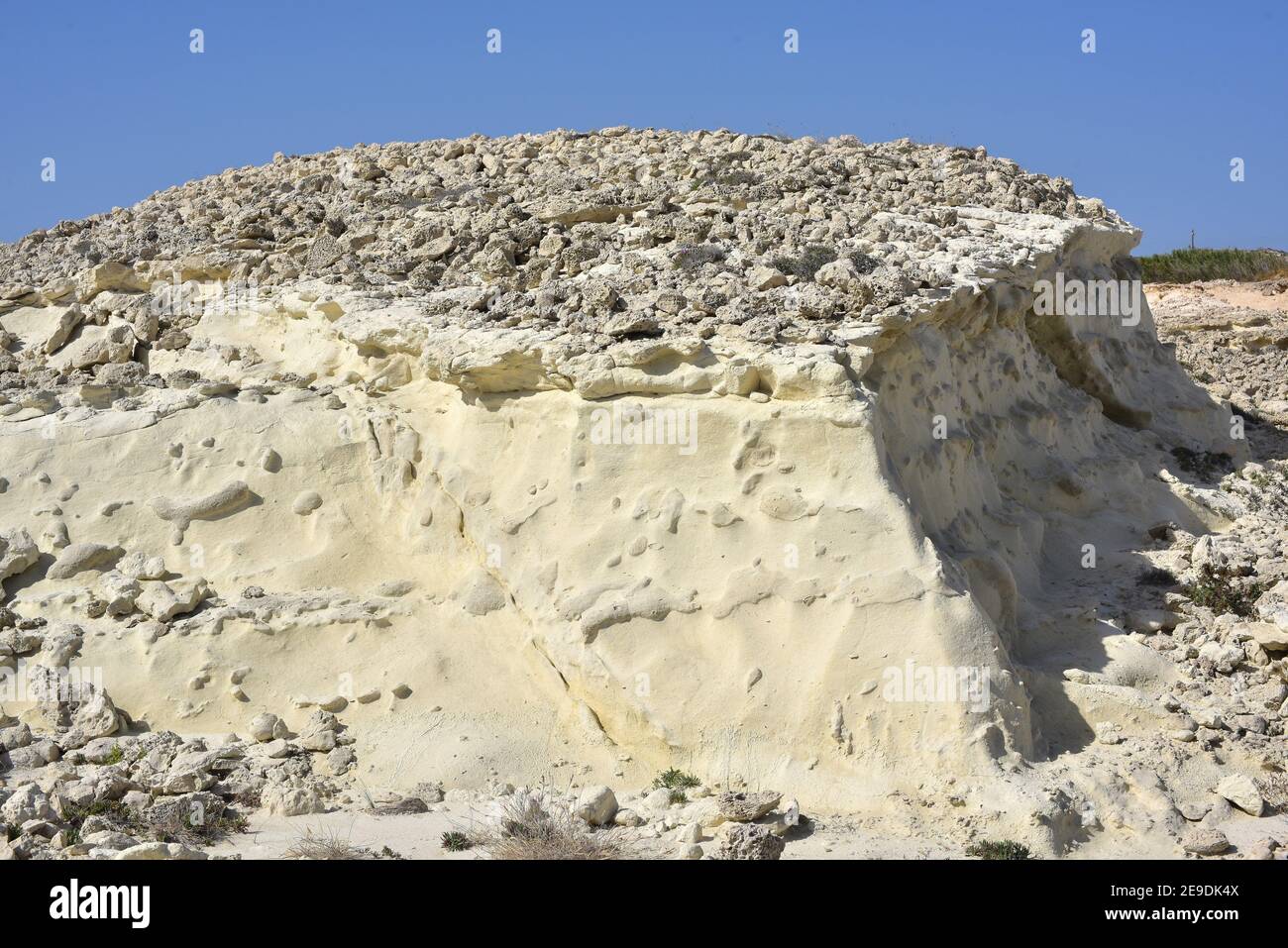 Volcanic coast with consolidated and not consolidated pyroclasts (tuff). Sarakiniko, Milos Island, Greece. Stock Photo