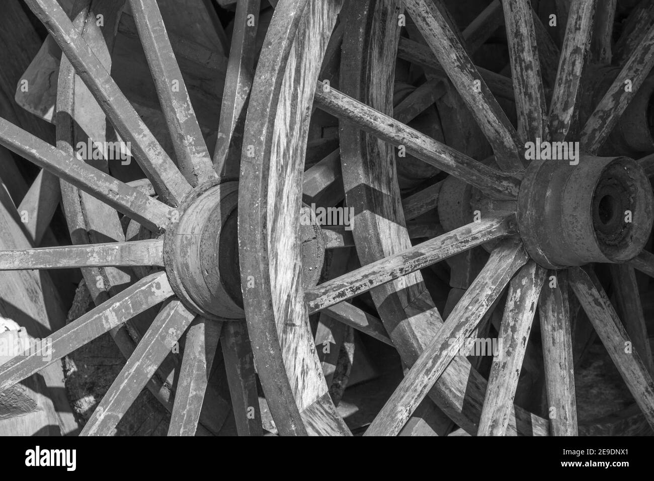 Grayscale shot of wooden wagon wheels Stock Photo Alamy