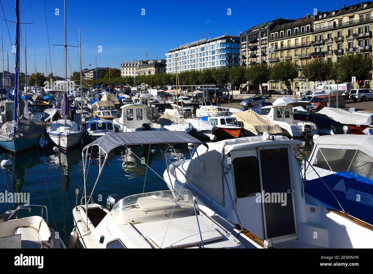 View from marina for waterfront luxury 5 star hotels - Beau Rivage Genève hotel, Hôtel d'Angleterre Genève , Grand Hotel Kempinski Geneva, Quai du Stock Photo