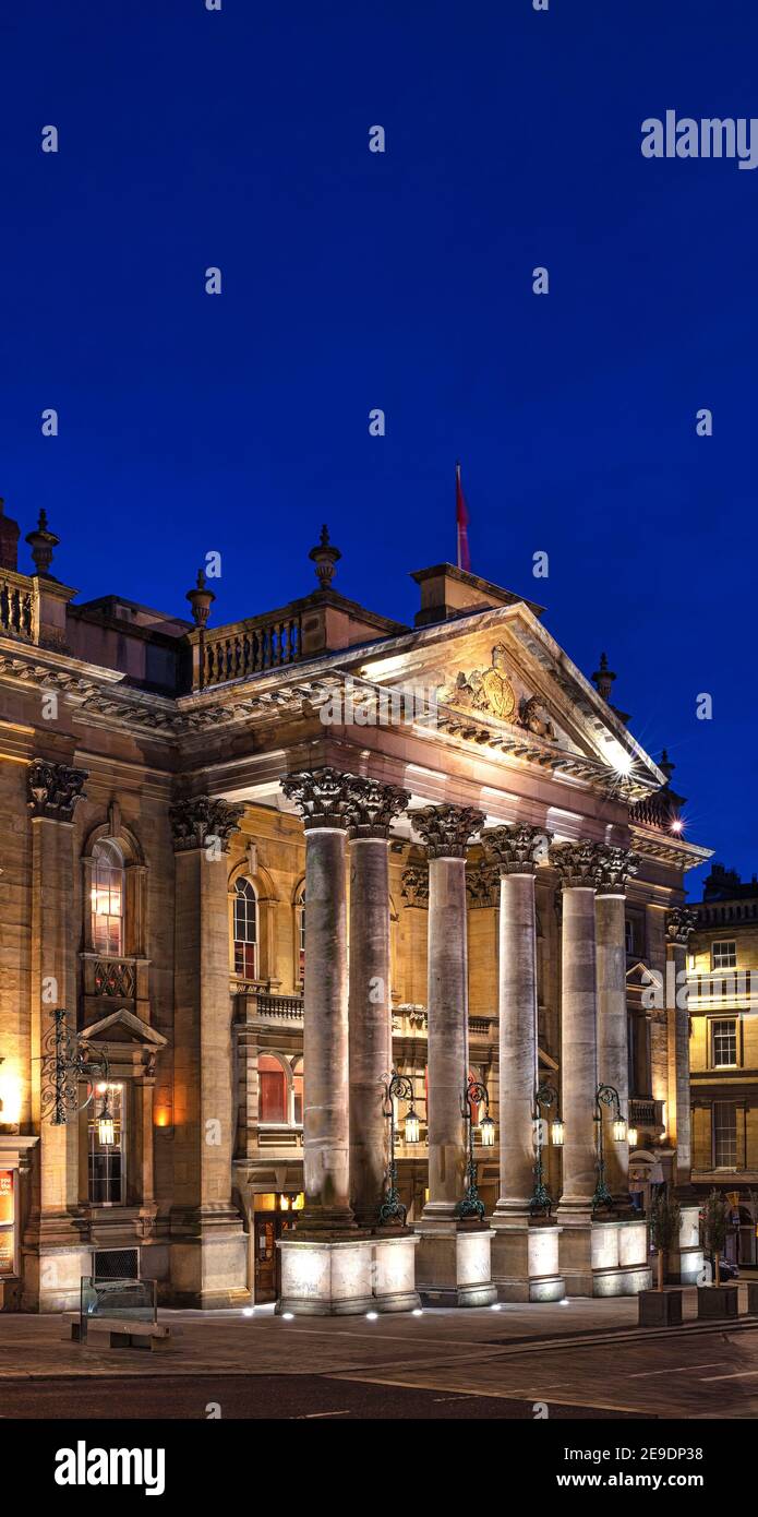 The Newcastle Theatre Royal floodlit at dusk, Newcastle upon Tyne, England, United Kingdom Stock Photo