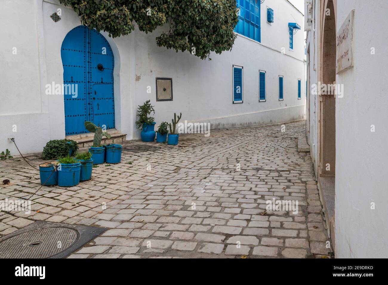 The cobbled streets of Sidi Bou Said. The blue and white tourist attraction overlooking the Mediterranean Sea. Tunisia, Africa. Stock Photo