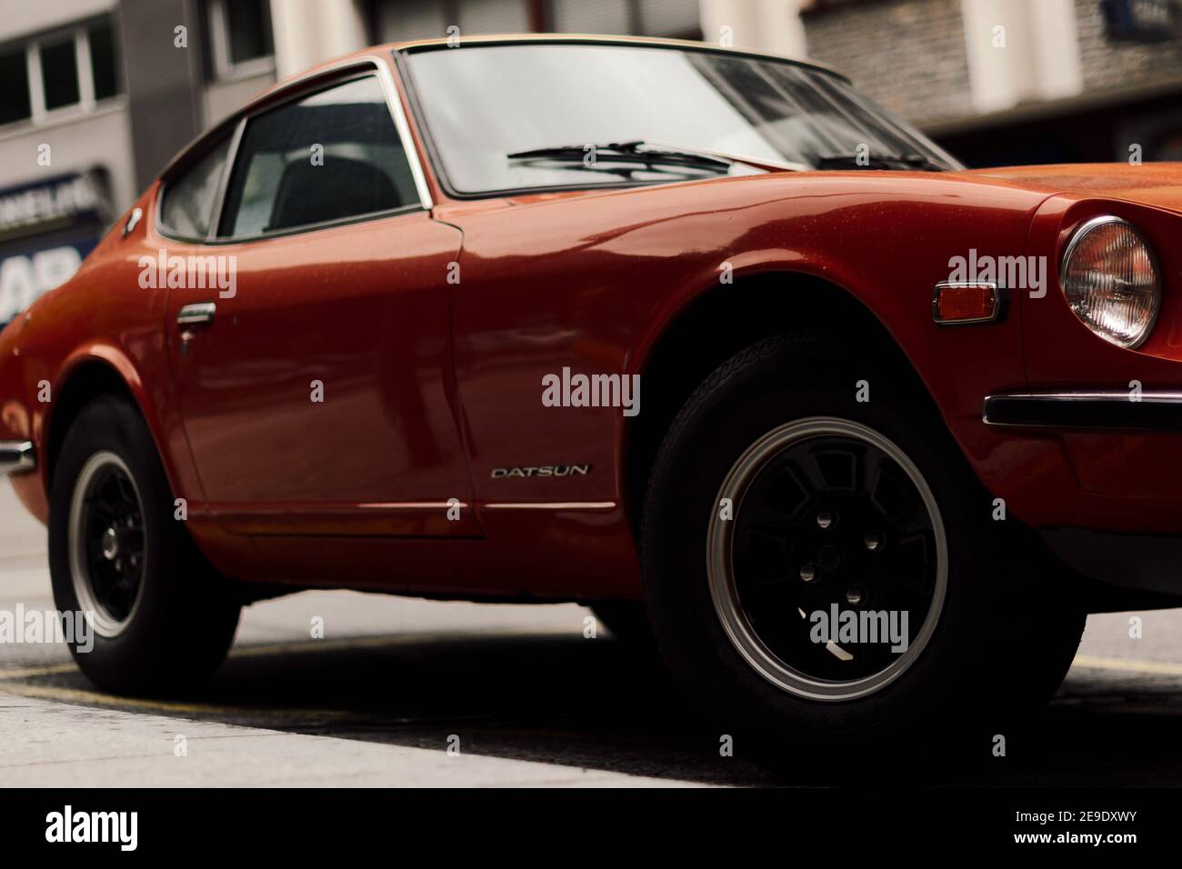 ANDORRA, ANDORRA - Aug 08, 2015: Selective Focus - View of the classic car Datsun 240Z by Nissan, parked in Andorra in a rainy dayClassic sports car o Stock Photo