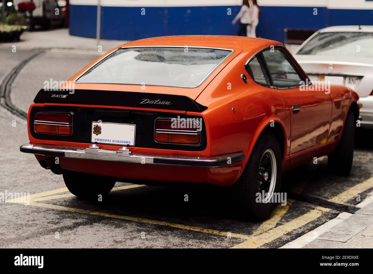 ANDORRA, ANDORRA - Aug 08, 2015: Selective Focus - View of the classic car Datsun 240Z by Nissan, parked in Andorra in a rainy day. Classic sports car Stock Photo