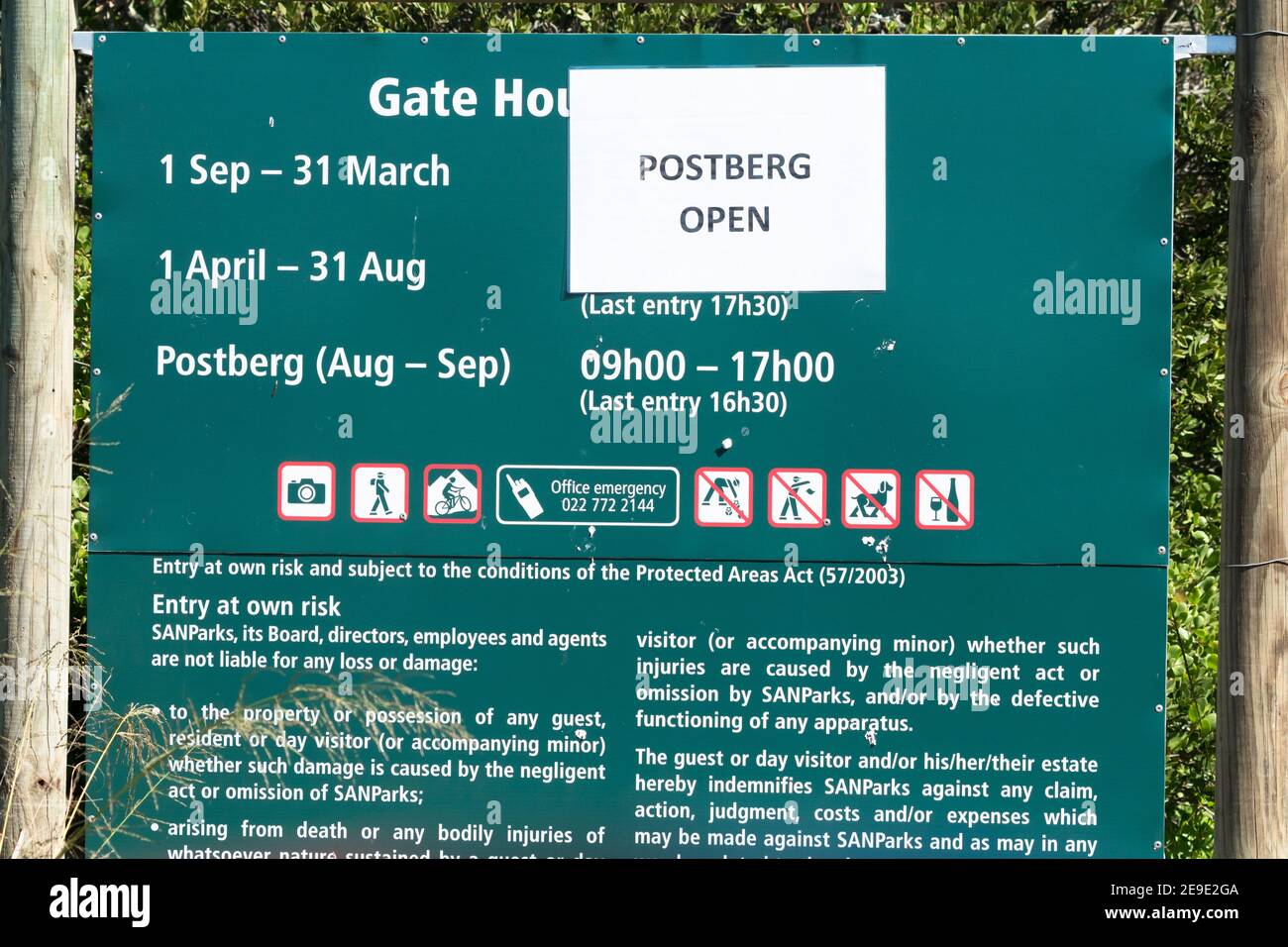 sign at Postberg nature reserve in the West Coast national park at the time of seasonal Spring flowers to indicate opening hours and times for tourism Stock Photo