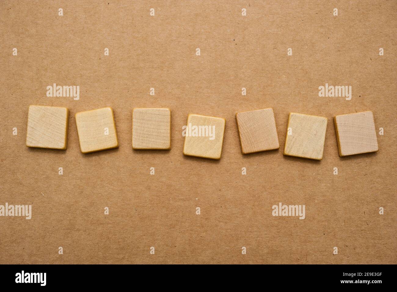 seven blank Scrabble tiles Stock Photo Alamy