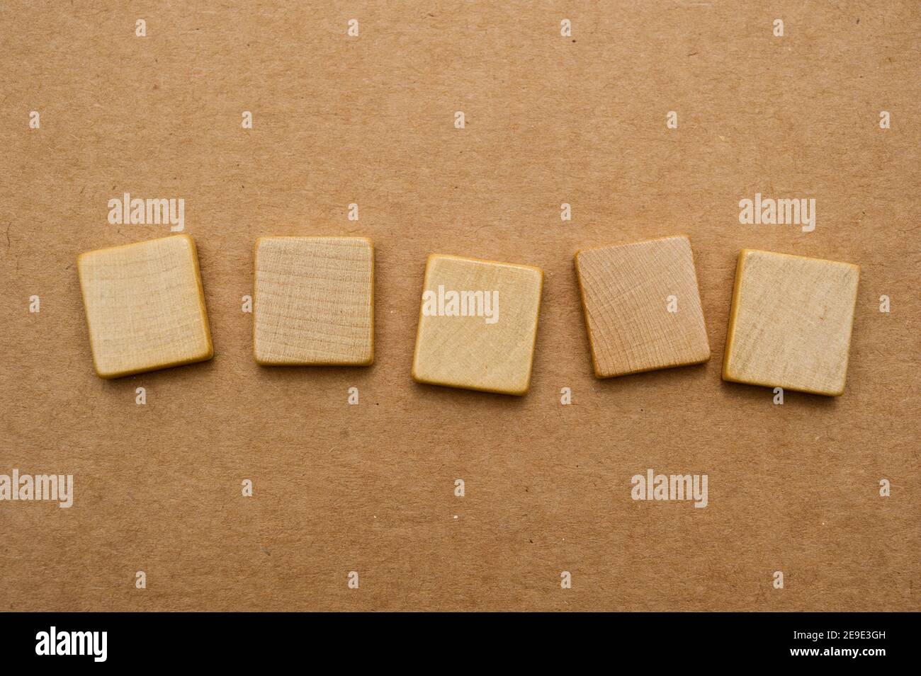 five blank Scrabble tiles Stock Photo Alamy