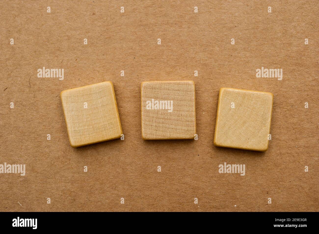 three blank Scrabble tiles Stock Photo Alamy