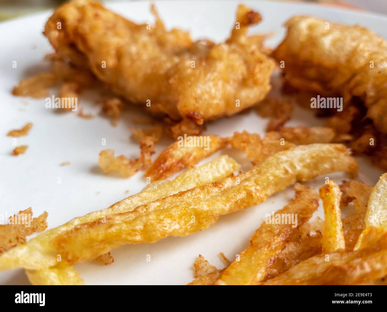 Home made fish and chips on a plate. Stock Photo