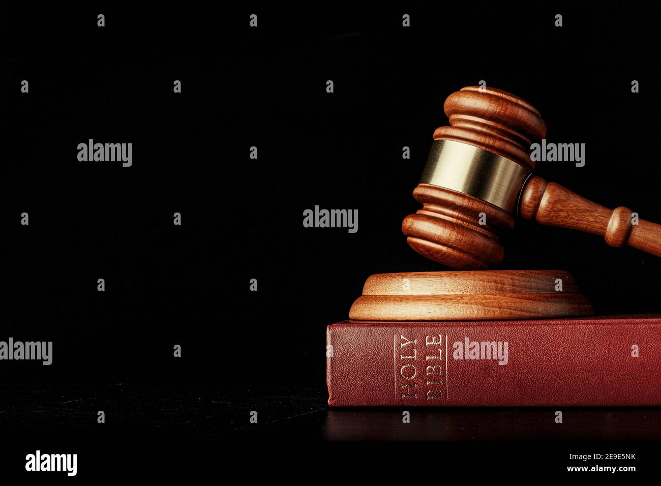 judge gavel with holy bible on black background Stock Photo Alamy