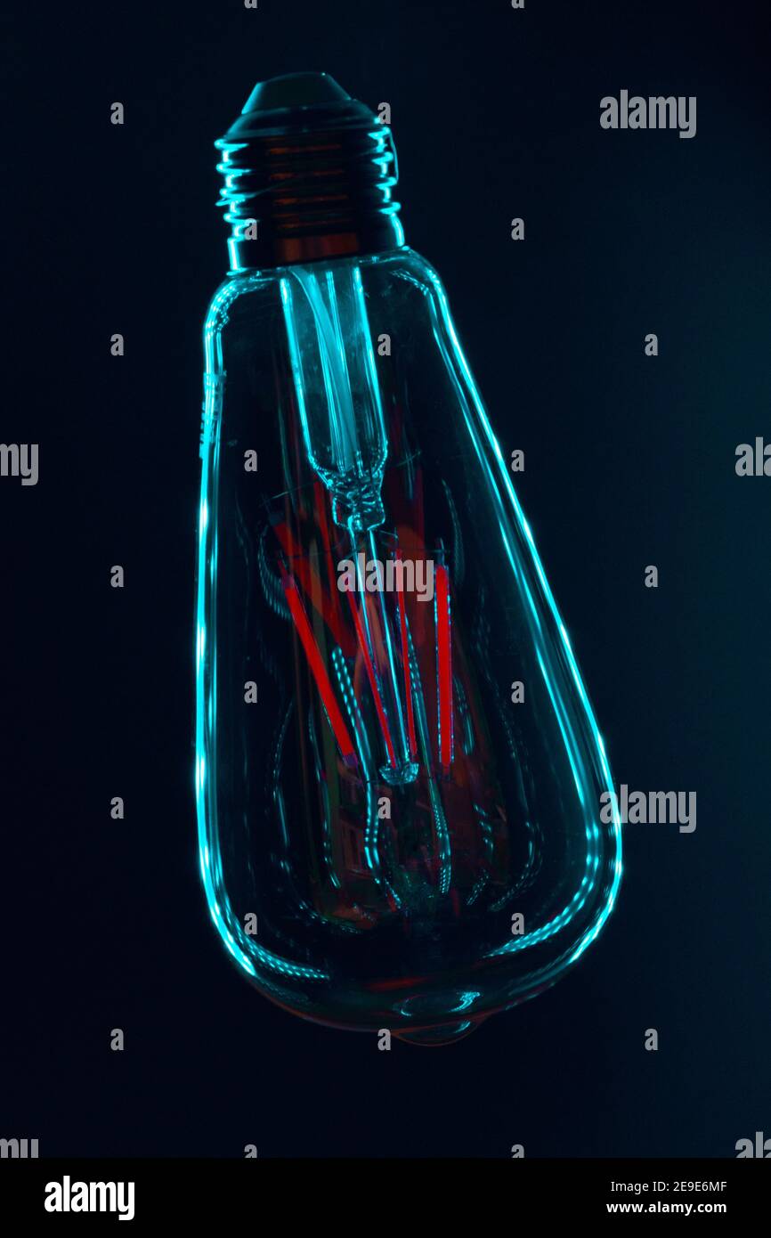 Light bulb on black background close up Stock Photo Alamy