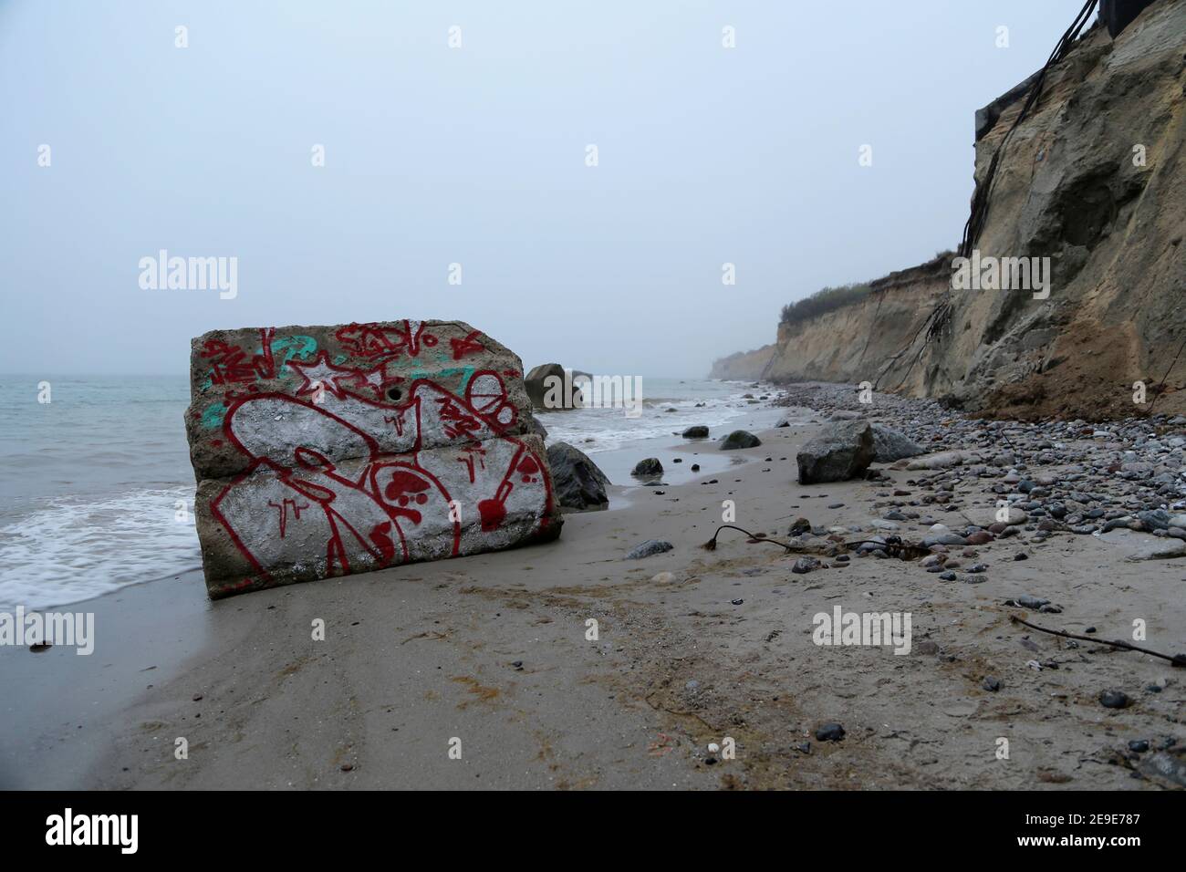 Ruins of bunkers on the beach of the Baltic Sea Stock Photo