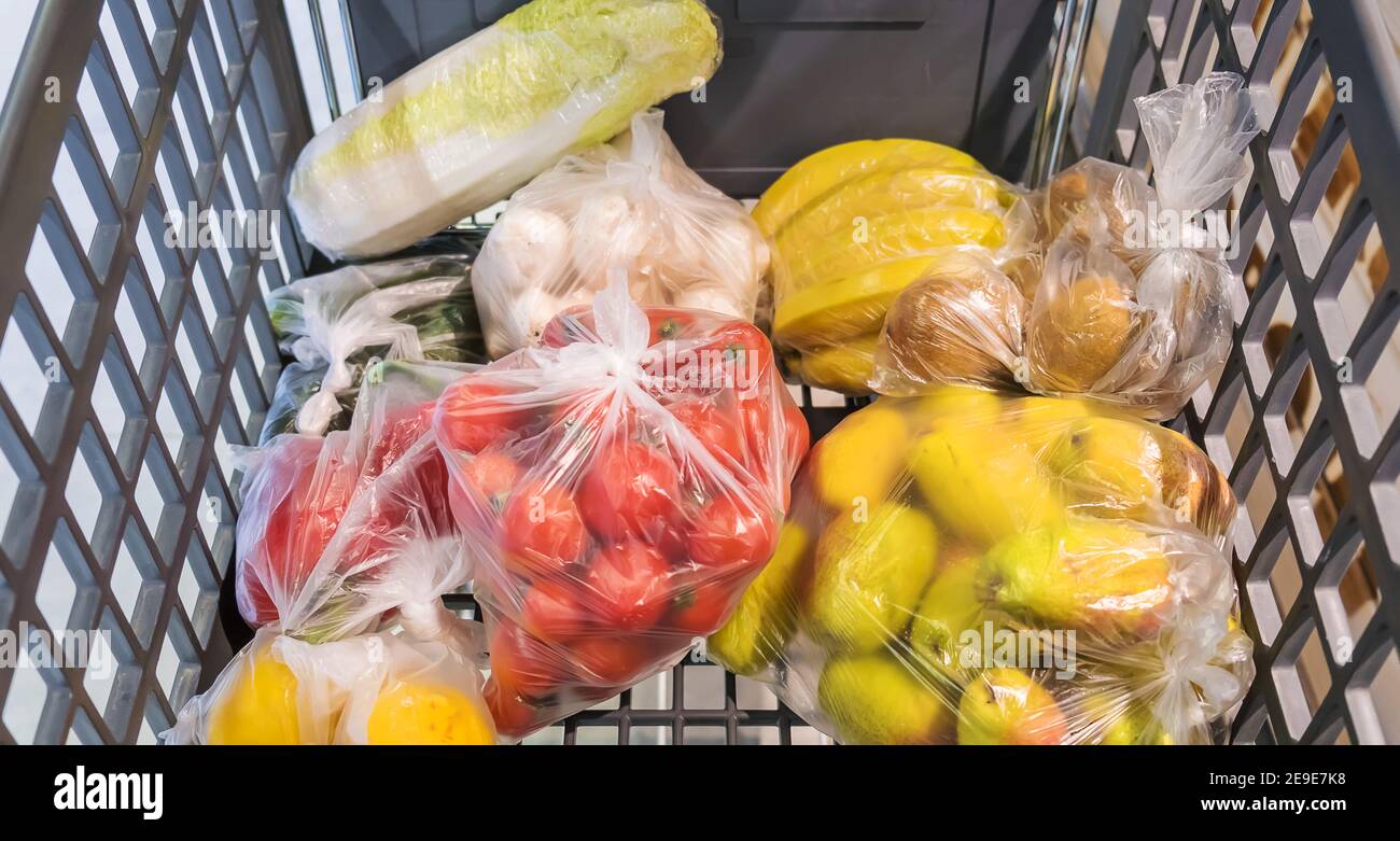 Food in plastic bags in the store. Selective focus. Food Stock Photo