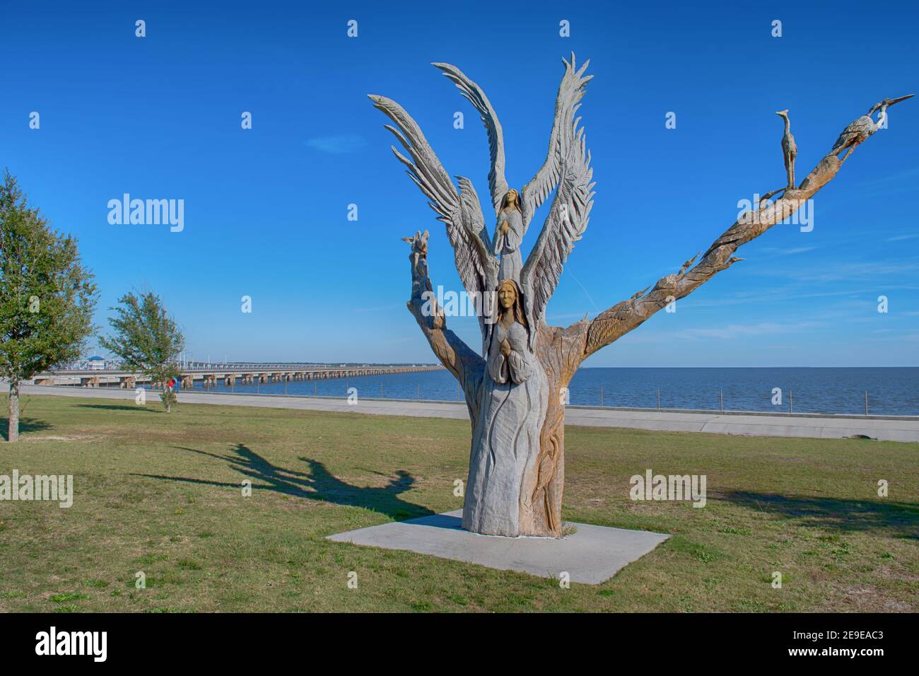 Angel Tree of Bay St Louis, chainsaw carving by Dayle Lewis in a giant oak killed by Hurricane Katrina's salt water storm surge, Mississippi USA. Stock Photo