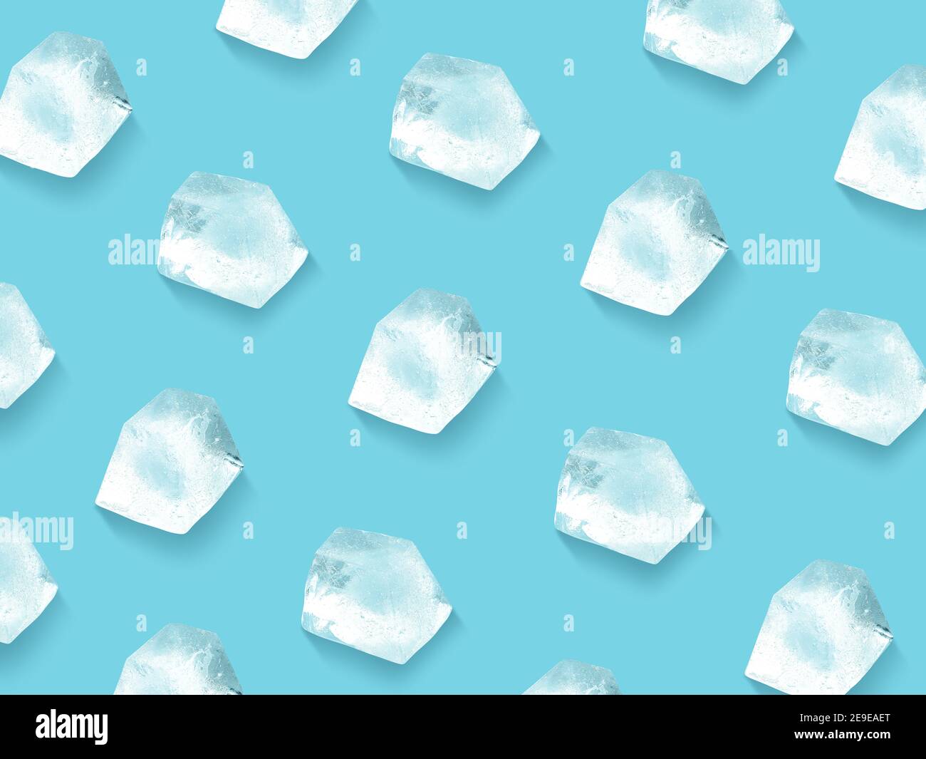 Ice cube pattern. Ice cubes with soft shadow on light blue background Stock Photo