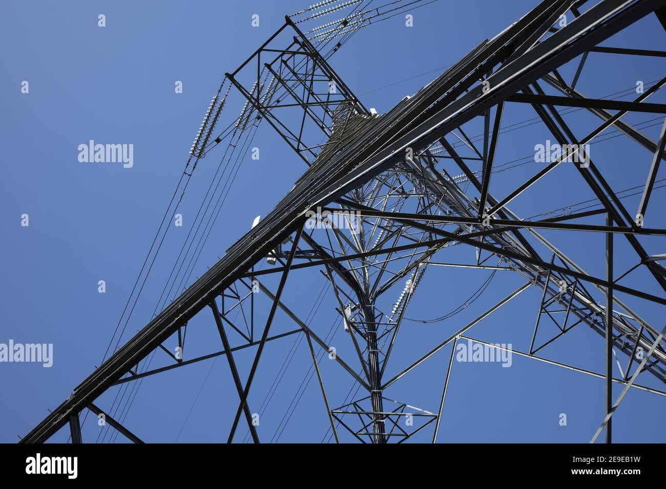 Low angle shot of a tall transmission tower Stock Photo - Alamy