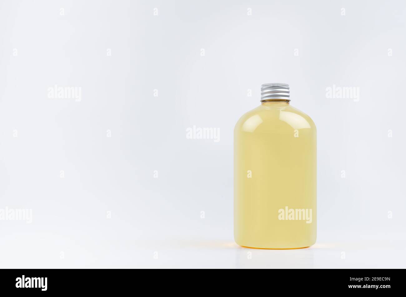 Download Transparent Plastic Low Thick Bottle With Orange Drink Cooking Oil Or Cosmetic Produce With Silver Cap Mockup On White Background Template Copy Spa Stock Photo Alamy