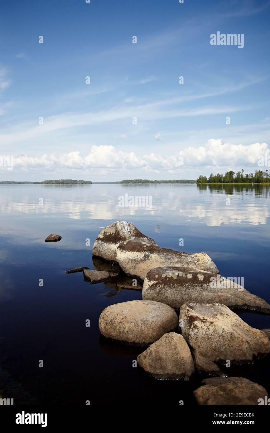 Water landscape with stones. Stones in water. The lake with stones ...