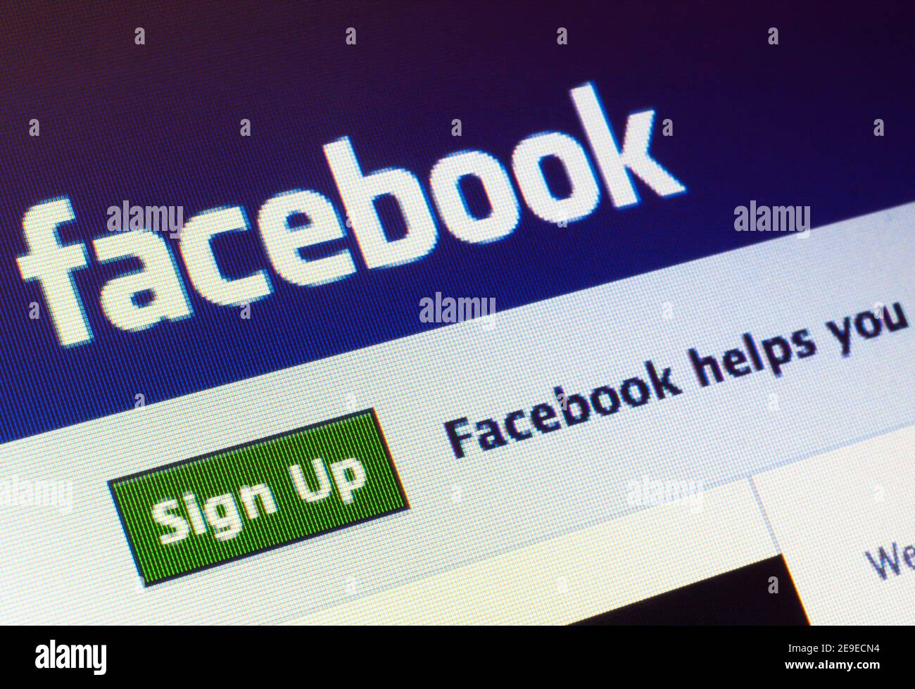 Facebook.com homepage on the screen. Facebook is an online social networking and microblogging service Stock Photo