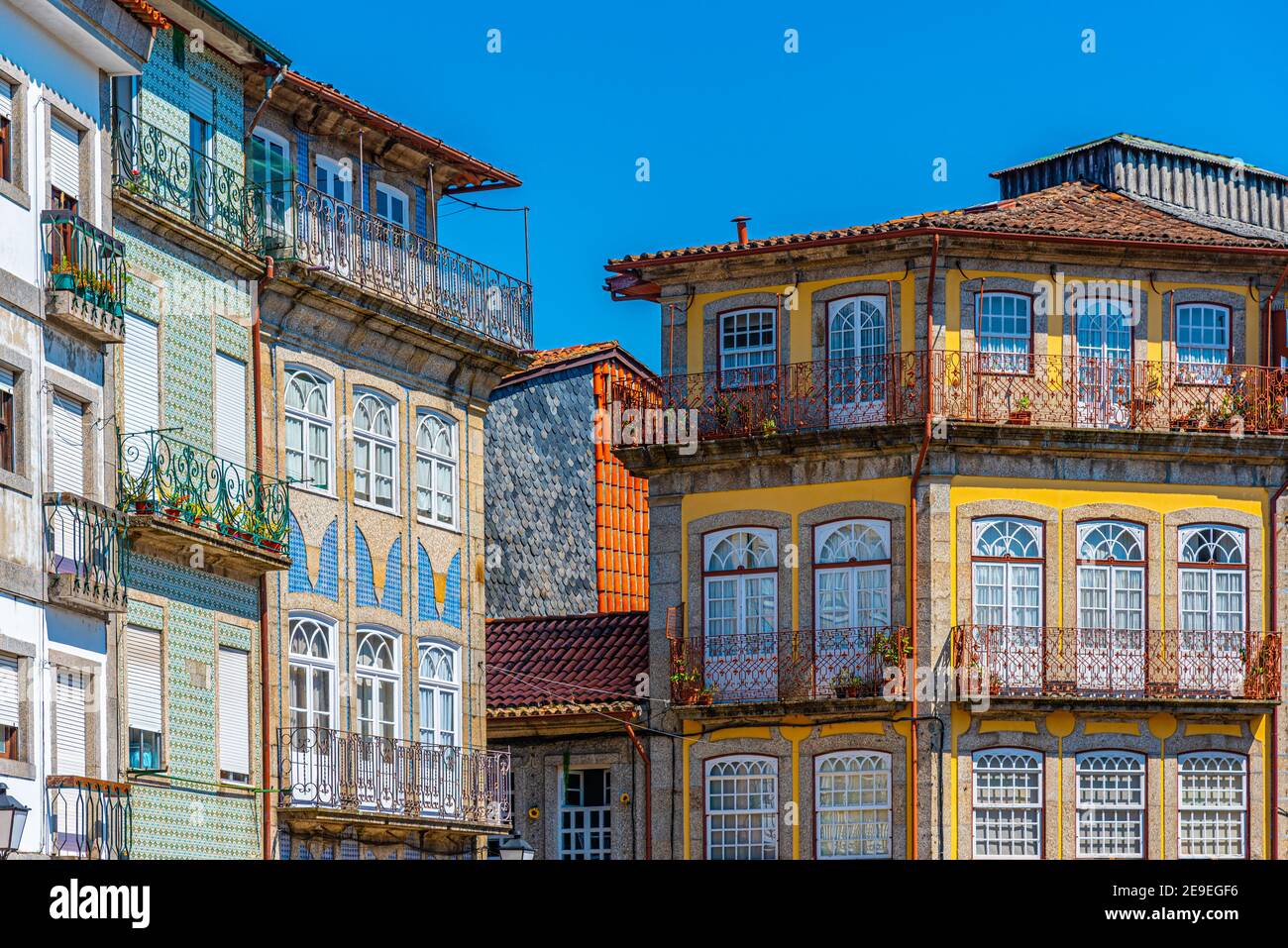 Colorful facades of houses in Guimaraes, Portugal Stock Photo Alamy