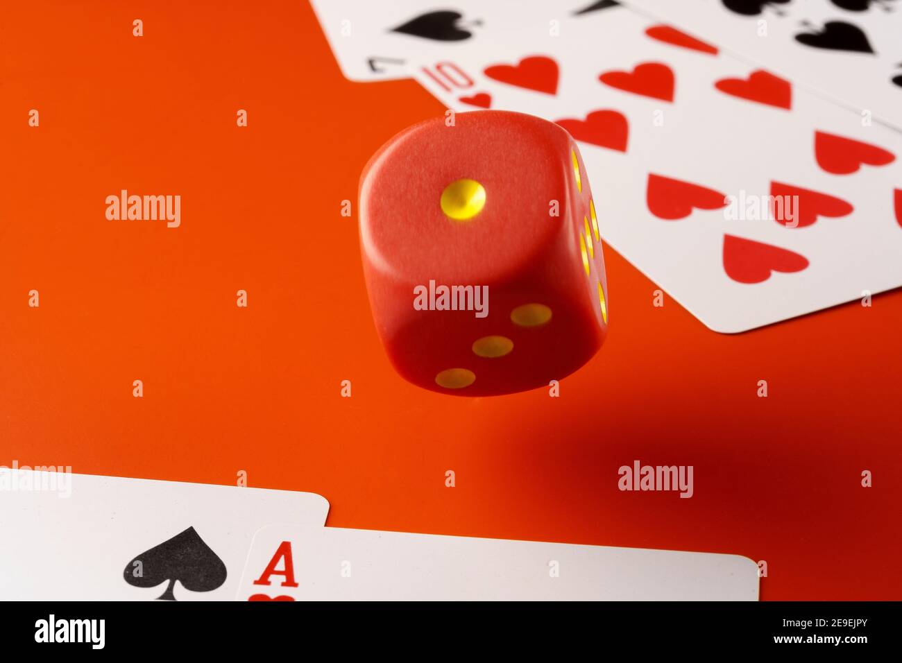 Playing cards with red dice. Casino and gambling concept Stock Photo