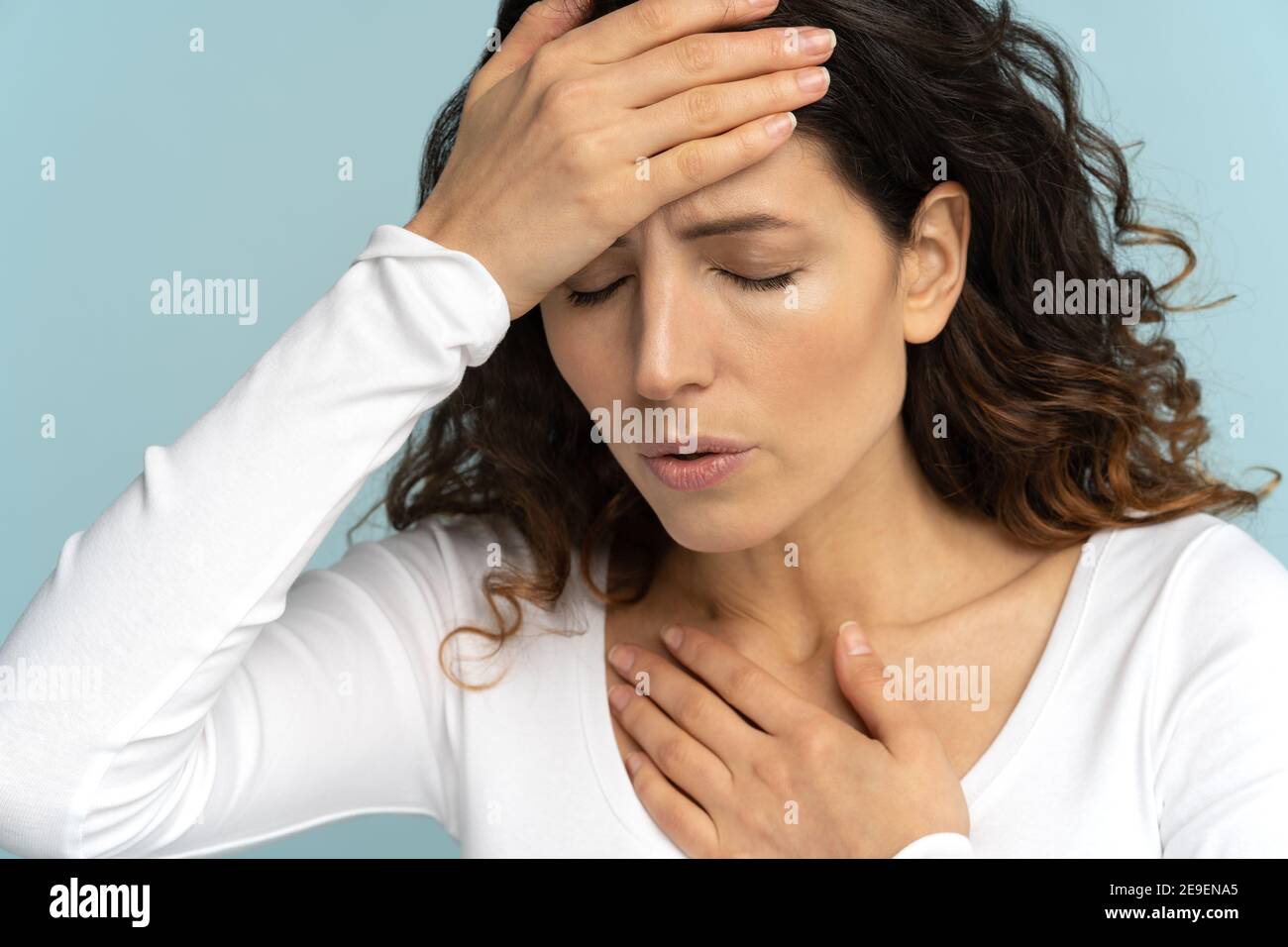 Woman received heatstroke in hot summer weather touching her forehead