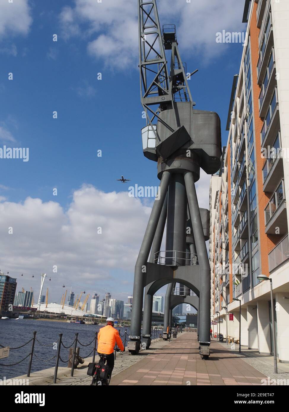 view of preserved old dockland cranes and modern apartments at Royal