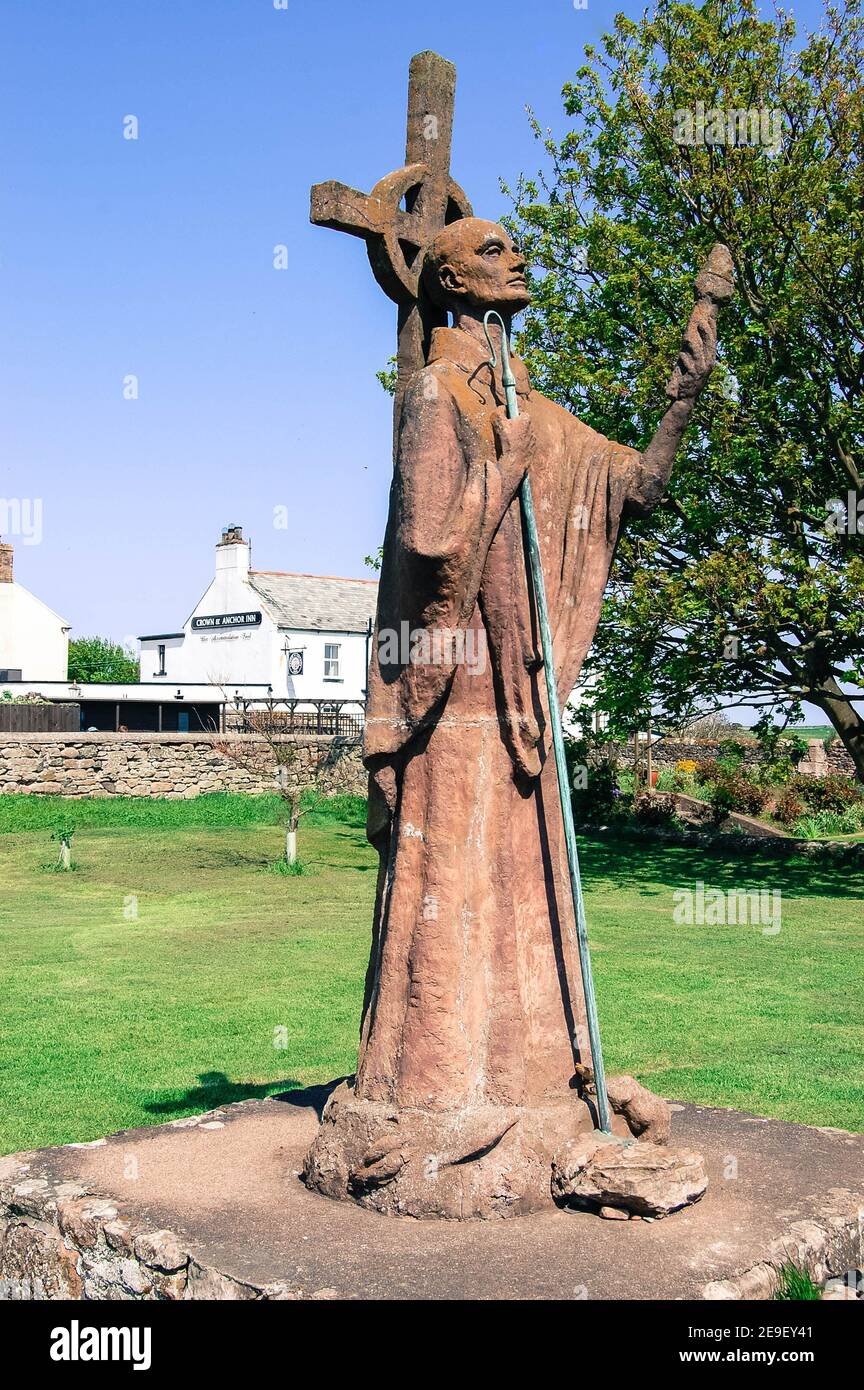 St Cuthbert holding a cross Northumberland UK priest Anglo Saxon Saint