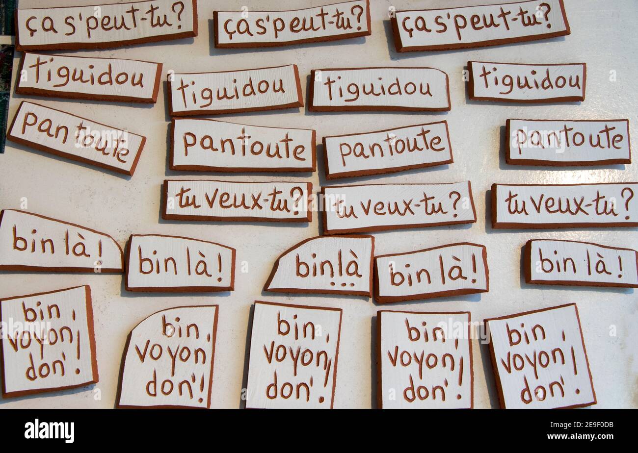 November 9, 2020 - Montreal, Qc, Canada: Quebecois French Canadian expressions on craft Terracotta fridge magnets in a souvenir shop, art design Stock Photo