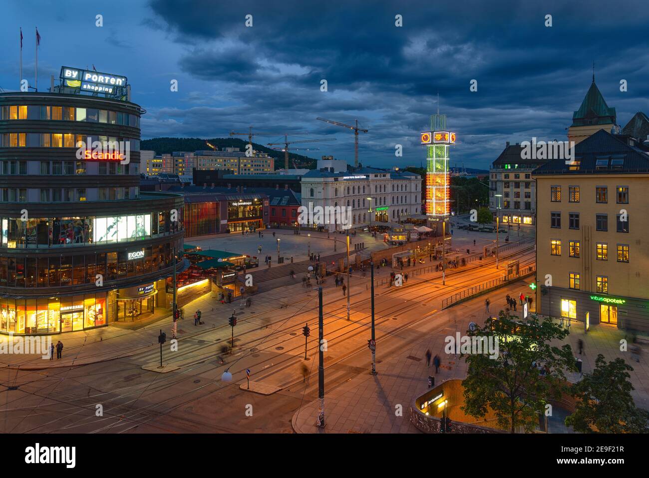 Oslo, Norway - August 10, 2016: View of Central Station and Jernbanetorget square at dusk. This station is the main railway station in Oslo Stock Photo