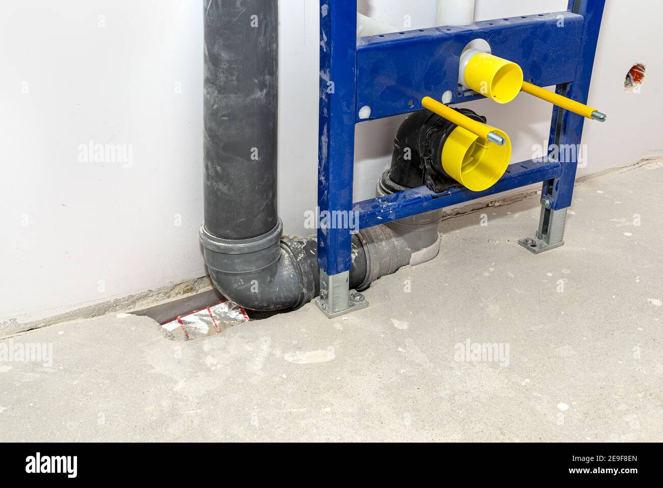 Newly installed WC concealed frame for wall-mounted toilet connected to the  aeration pipe and sewage system in the bathroom Stock Photo - Alamy