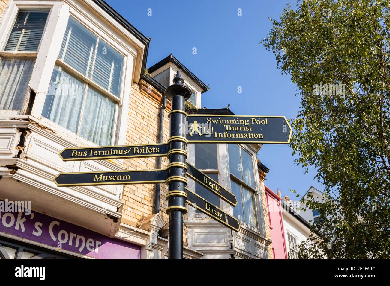Information signpost pointing to local attractions, amenities and places of interest in Sidmouth, a coastal town in Devon on the Jurassic Coast Stock Photo