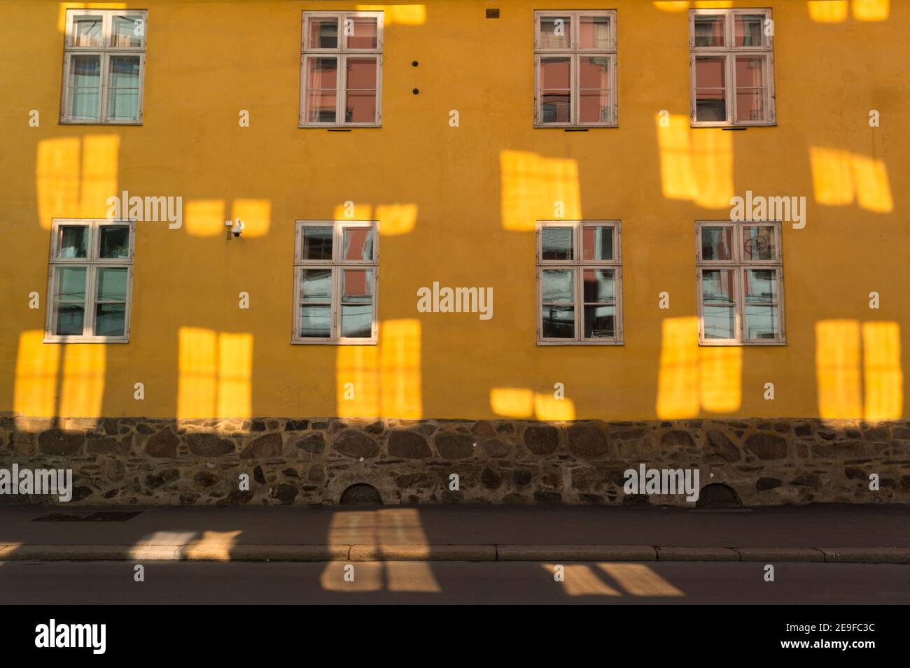 Reflections on a building, Fred Olsens gate, Oslo, Norway. Stock Photo